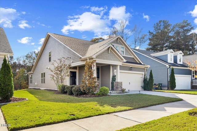 view of front facade with a garage and a front yard