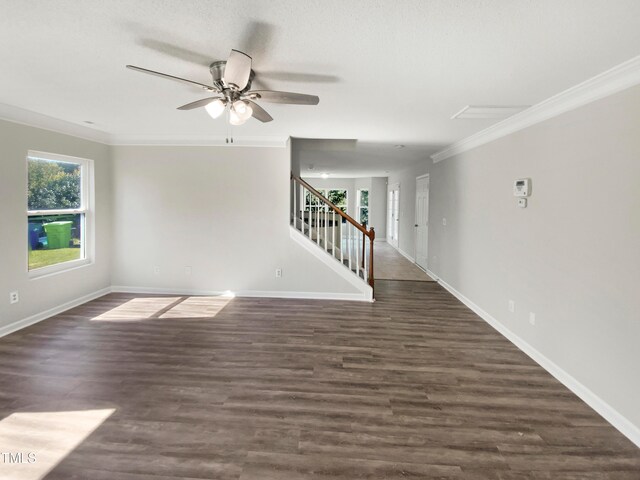 unfurnished room with crown molding, dark hardwood / wood-style flooring, and ceiling fan