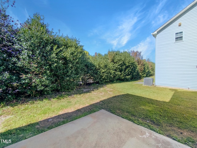 view of yard with a patio and cooling unit