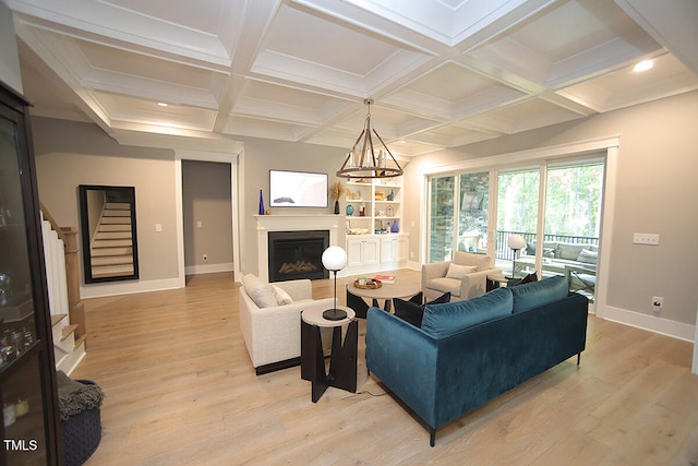 living room with beamed ceiling, coffered ceiling, and light wood-type flooring