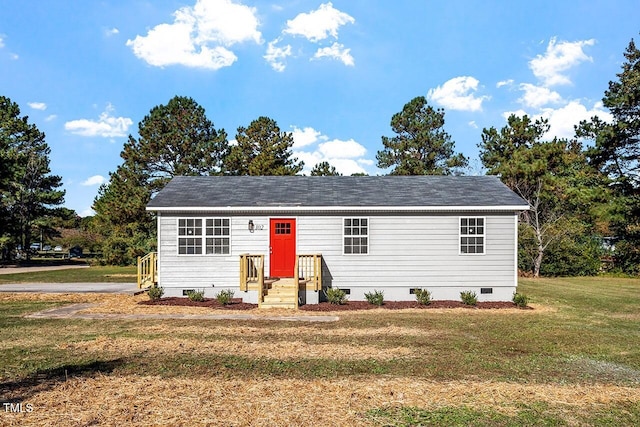 view of front of home with a front yard