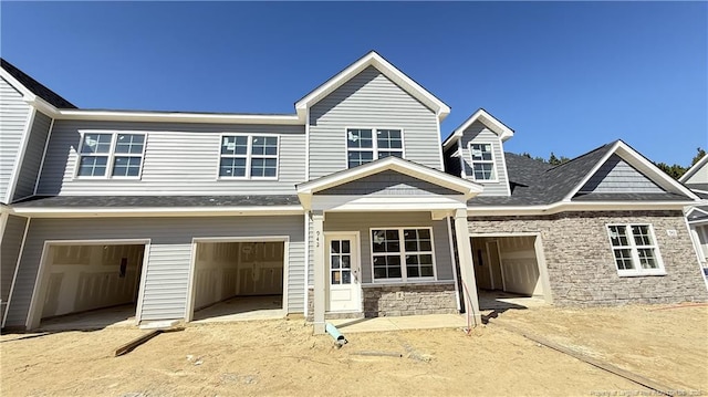 view of front of house with a garage and driveway