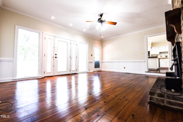 living room featuring crown molding, dark hardwood / wood-style flooring, and ceiling fan