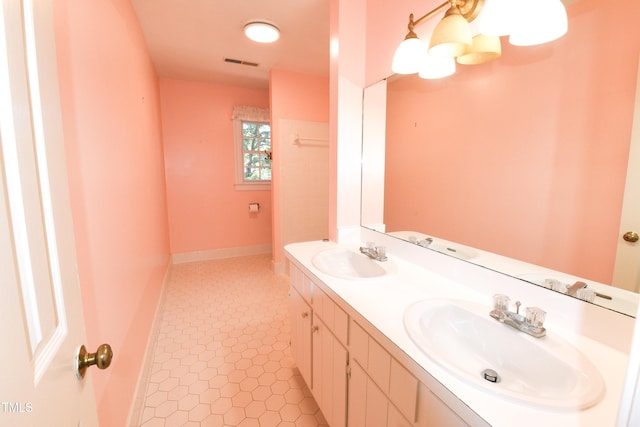 bathroom featuring vanity and tile patterned floors