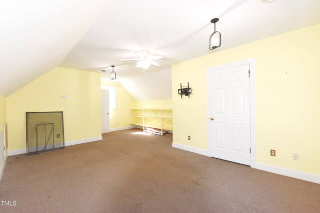 additional living space featuring ceiling fan, carpet flooring, and lofted ceiling