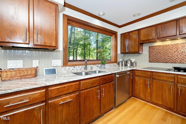 kitchen featuring dishwasher, sink, crown molding, backsplash, and light hardwood / wood-style flooring