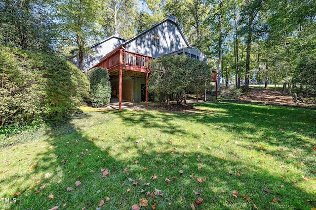 view of yard with a wooden deck