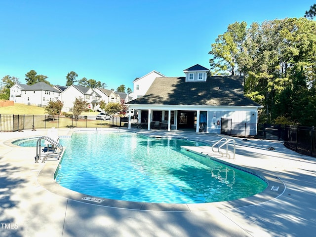 view of swimming pool featuring a patio