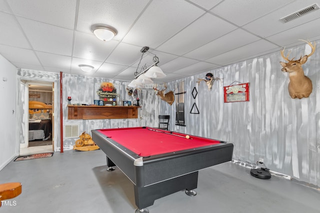 playroom featuring a paneled ceiling, billiards, and concrete flooring