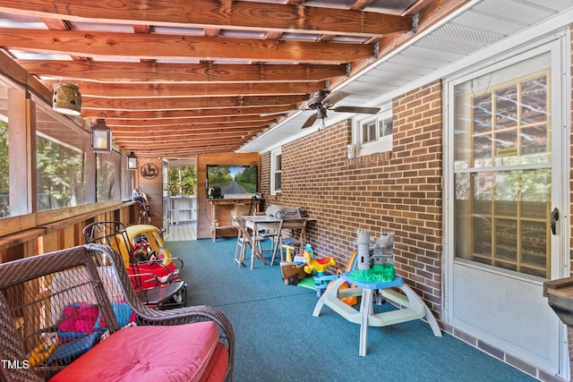 view of patio featuring ceiling fan