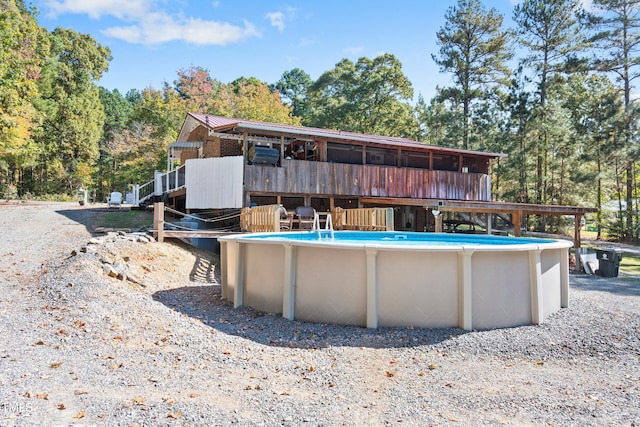 view of pool featuring a deck