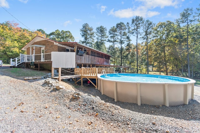 view of pool featuring a wooden deck