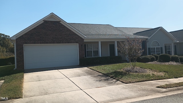 ranch-style house with a front lawn and a garage