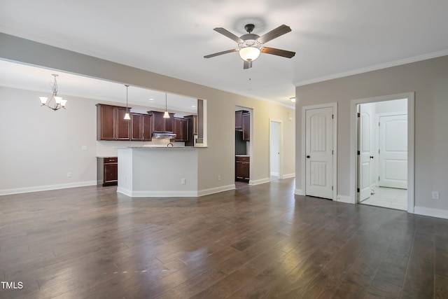 unfurnished living room featuring ceiling fan with notable chandelier, crown molding, and dark hardwood / wood-style floors