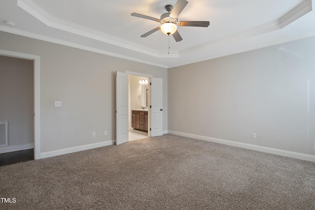 unfurnished bedroom featuring crown molding, ceiling fan, carpet flooring, and a raised ceiling