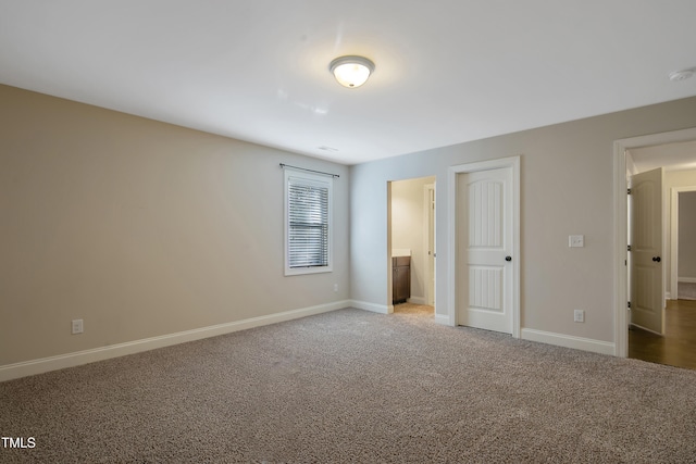 unfurnished bedroom with carpet