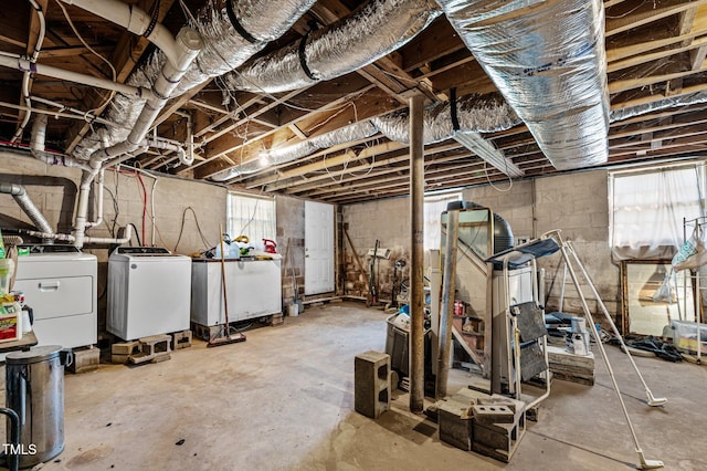 basement with washing machine and clothes dryer