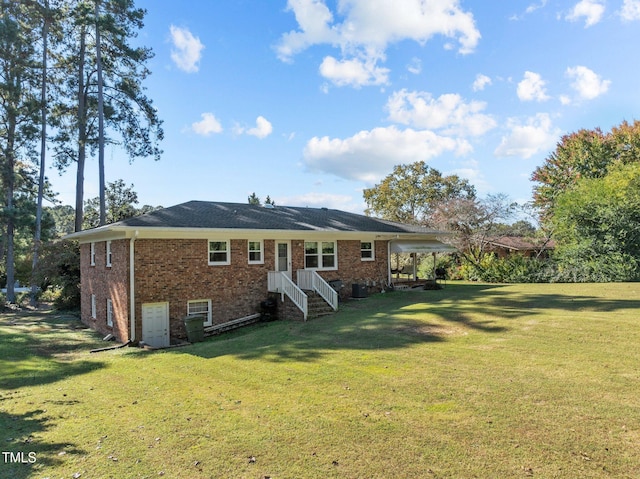 back of house featuring a yard