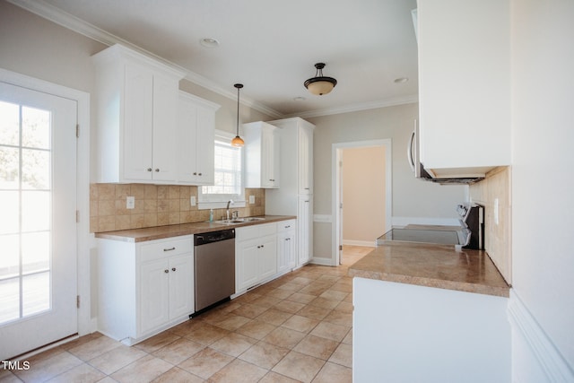 kitchen with decorative backsplash, white cabinetry, stainless steel appliances, and pendant lighting