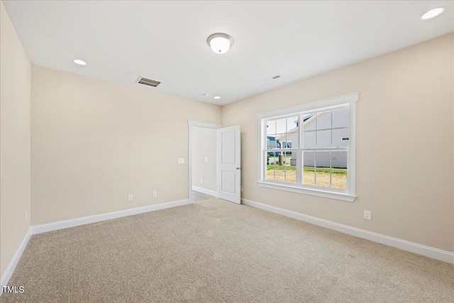 empty room featuring carpet floors