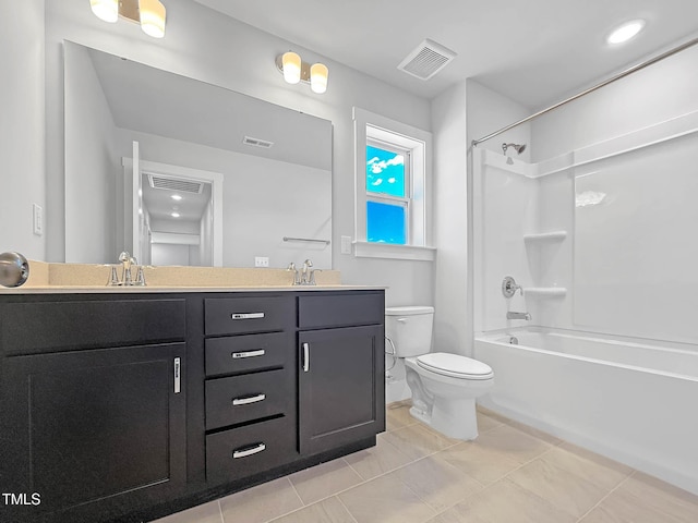bathroom featuring toilet, double vanity, shower / tub combination, and tile patterned floors