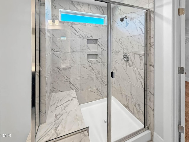 full bath featuring a stall shower