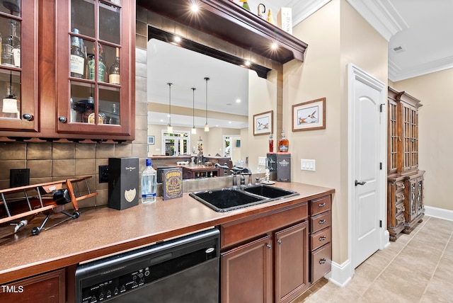 kitchen featuring tasteful backsplash, dishwasher, ornamental molding, and sink