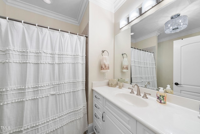 bathroom with vanity and ornamental molding