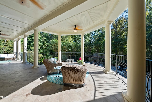 view of patio featuring ceiling fan