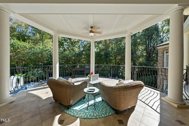 view of patio featuring ceiling fan