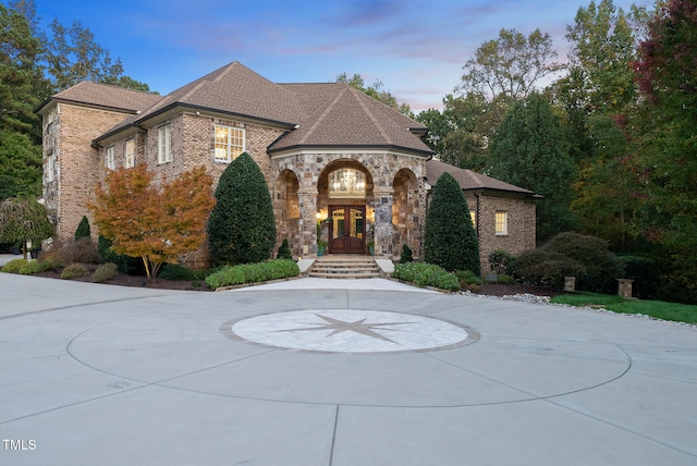 french country style house featuring french doors