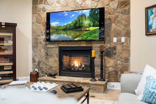 room details featuring a stone fireplace