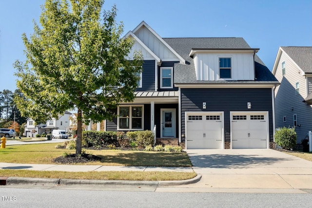 view of front facade featuring a front lawn and a garage