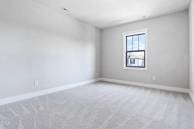 unfurnished room featuring carpet floors