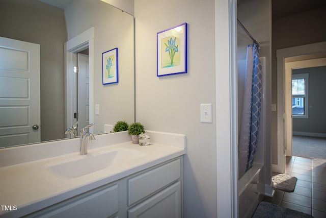 bathroom featuring vanity, shower / bathtub combination with curtain, and tile patterned floors