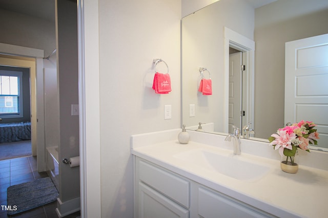 bathroom with vanity and tile patterned flooring