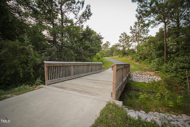 view of property's community with a wooden deck