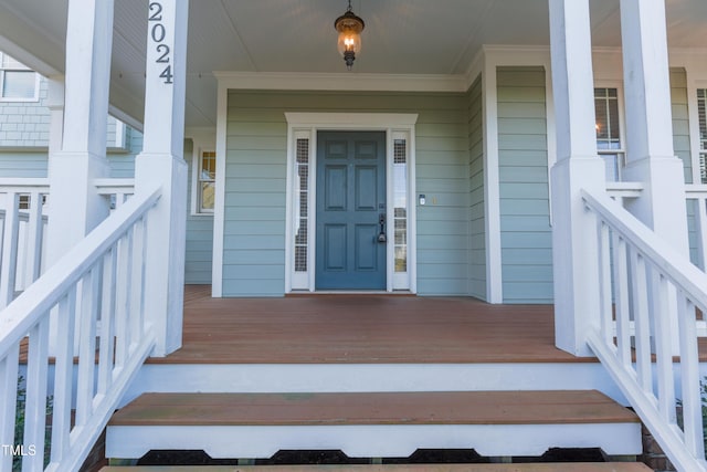 entrance to property with covered porch