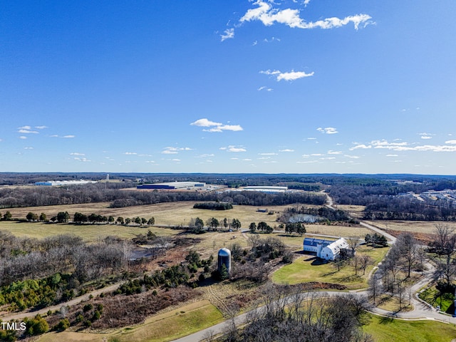 birds eye view of property with a rural view