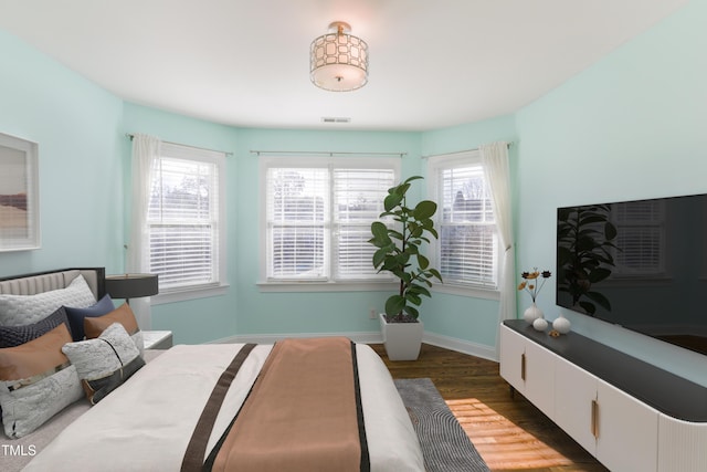 bedroom with wood-type flooring