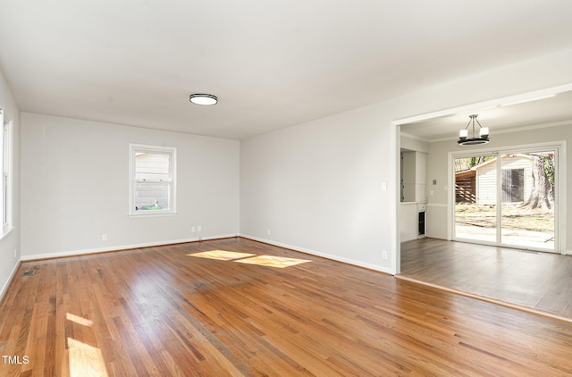 unfurnished room featuring light wood-type flooring