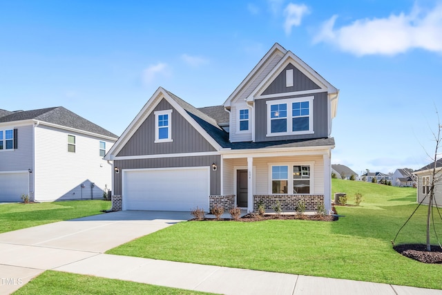 craftsman house featuring concrete driveway, an attached garage, covered porch, board and batten siding, and a front yard