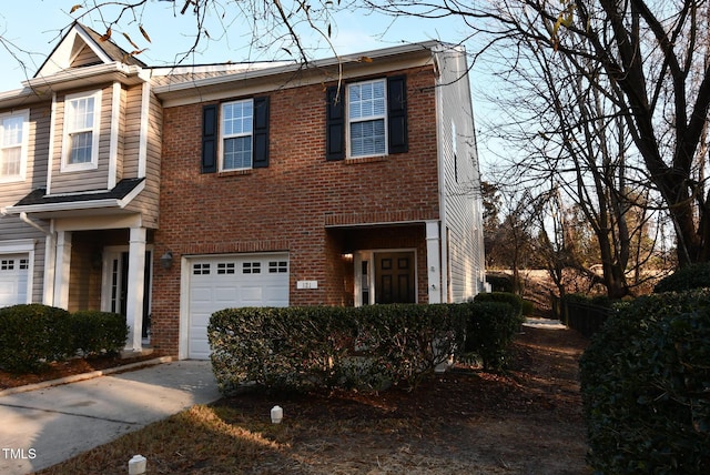 multi unit property featuring a garage