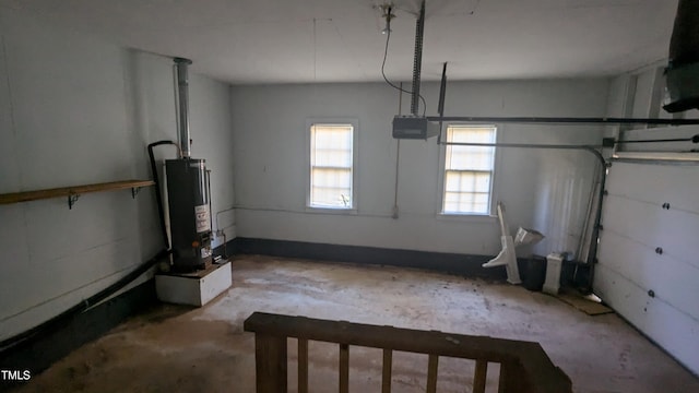 garage featuring water heater and a garage door opener