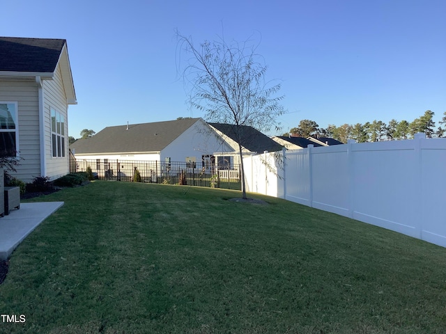 view of yard with central AC