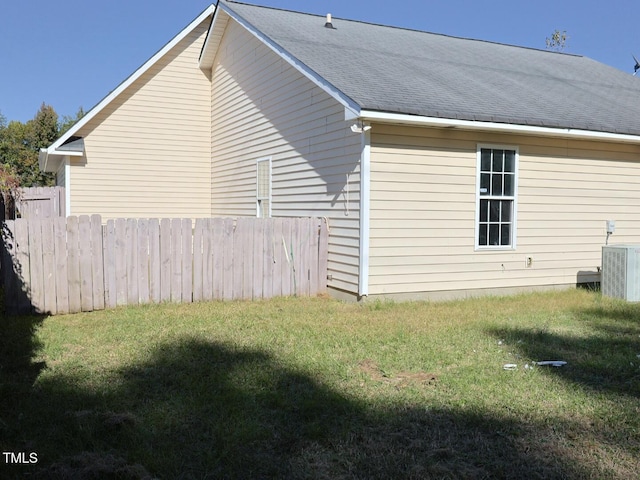 view of property exterior with central AC