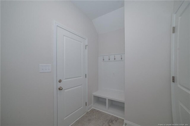 mudroom with lofted ceiling