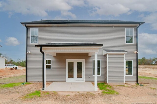 back of property featuring a patio area