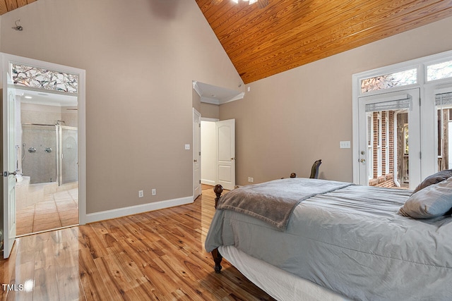 bedroom with access to exterior, ensuite bath, wooden ceiling, light wood-type flooring, and high vaulted ceiling