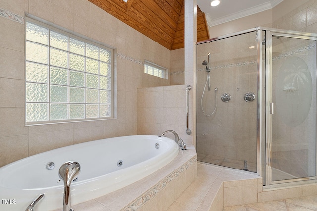 bathroom with tile patterned floors, ornamental molding, and plus walk in shower